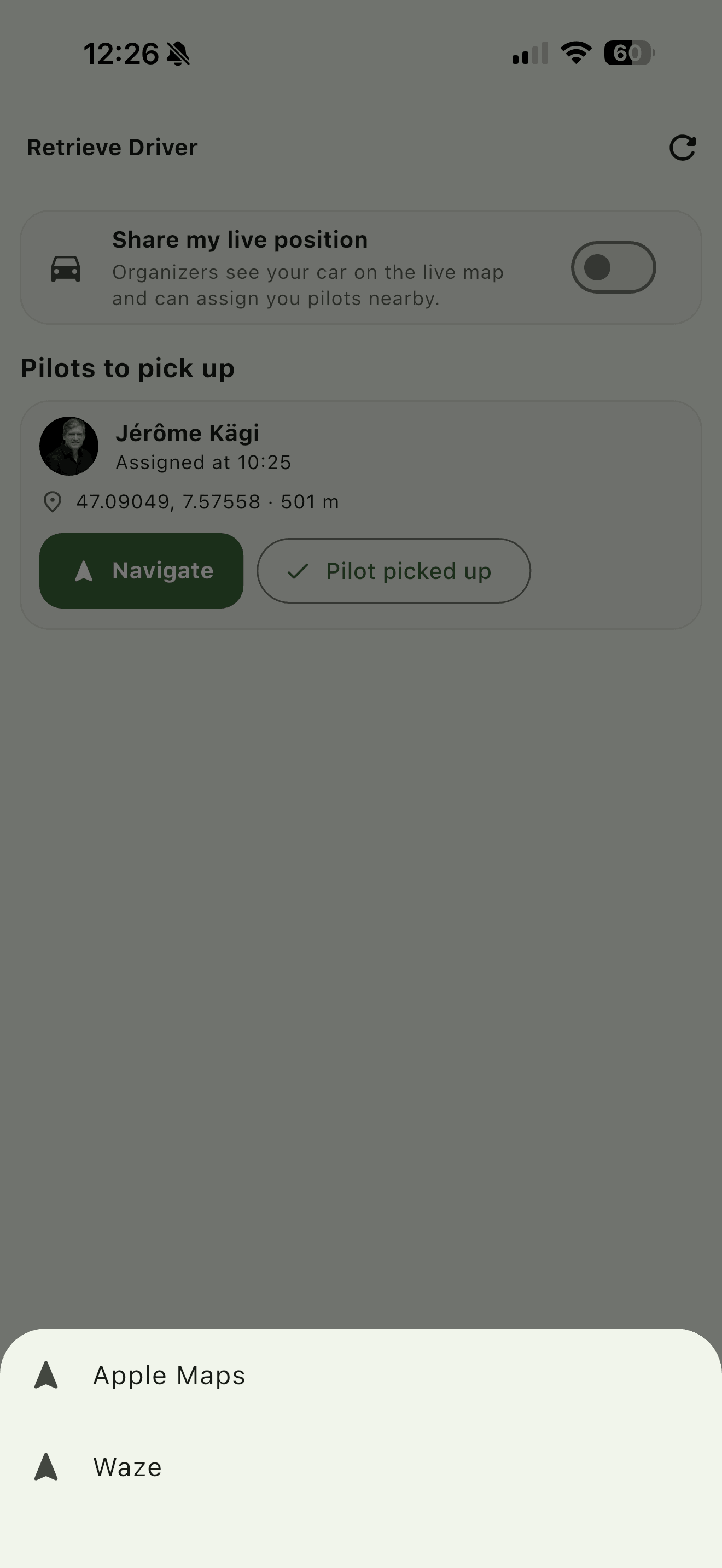 On an iPhone with more than one navigation app installed, Navigate asks which one to hand the coordinates to.